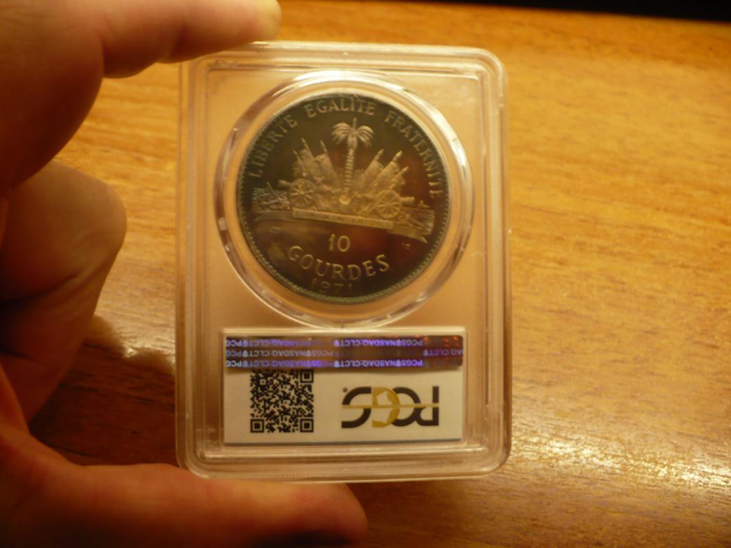 продам серебряную монету 10 гурдов 1971 г с индейцем Вес 47 грамм серебра Серебро 999 Кто не верит - - Орск