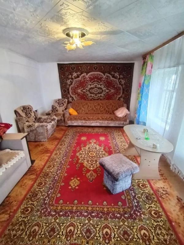 Продается уютный дом в живописном поселке Саверовка, расположенный на улице Центральной. - Гай