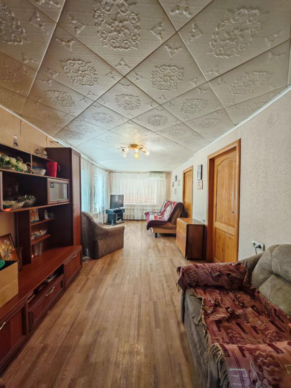 Продаётся одноэтажный деревянный дом, облицованный кирпичом, расположенный в городе Новотроицке на у - Новотроицк