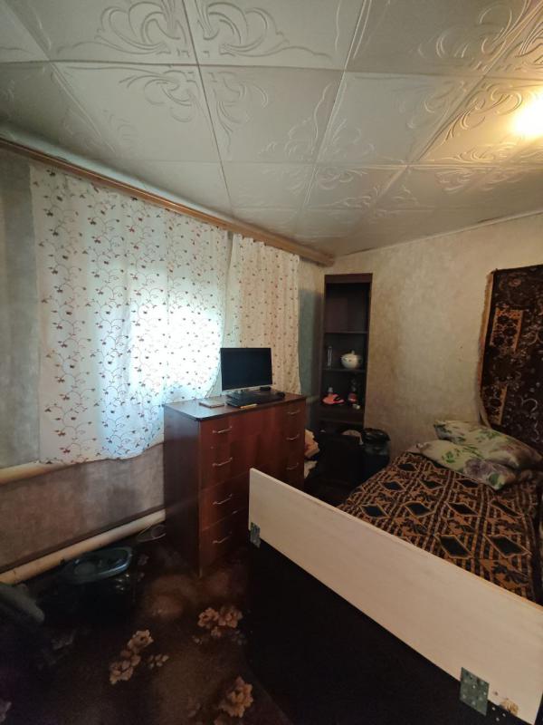 Продаётся одноэтажный деревянный дом, облицованный кирпичом, расположенный в городе Новотроицке на у - Новотроицк