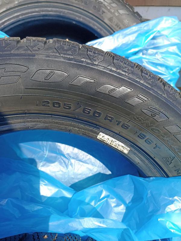 Продам комплект зимних шипованных а/шин Кордиант SNO - MAX размер 205/60 R 16, б/у 1.5 сезона. - Орск