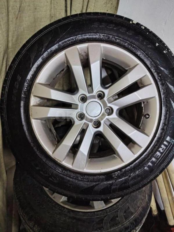 Продам комплект колес на литых оригинальных дисках на Джилли Эмгранд х7. - Орск