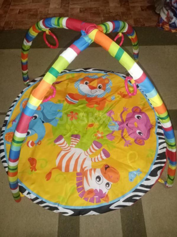 Развивающийся коврик, ходунки по 600р, интересная игрушка уточка на батарейках, ездит, крякает и выб - Орск