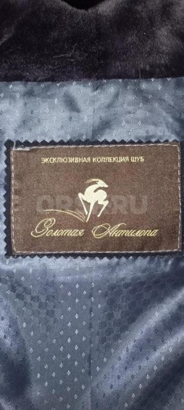 Продам шубу мутоновую с капюшоном слегка расклешенная цвет графит, выглядит как новая,,, карманы на - Орск