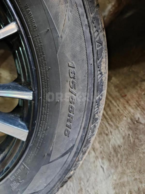 Продам резину летнюю с литыми дисками 185.65.15. - Орск