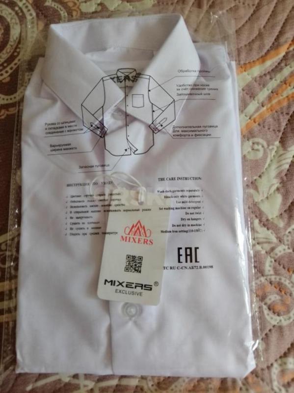 Продам новую школьную белую рубашку с коротким рукавом. - Орск