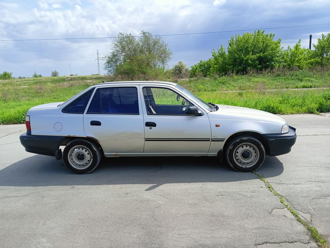 Продам Daewoo Nexia 2005 года, 2 хозяина, 2 комплекта резины. - 