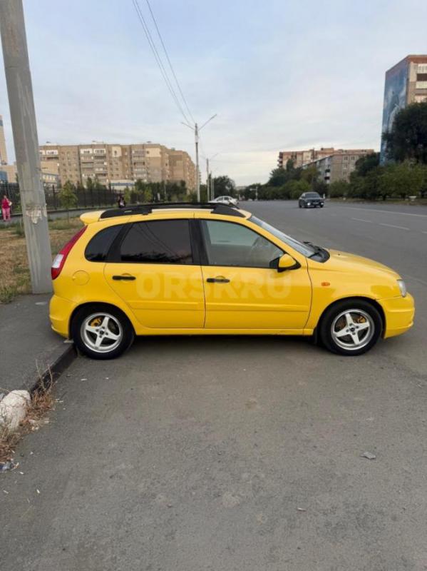 В продаже Лада калина спорт 1 в очень красивом ярком желтом цвете,установлен андроид планшет в дверн - Орск