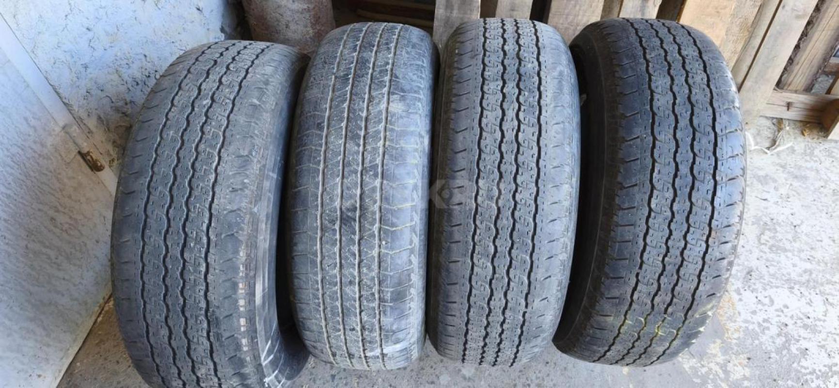 Продам японскую б/у резину Dueler  265/65 R17 112S, цена указана за комплект. - Орск